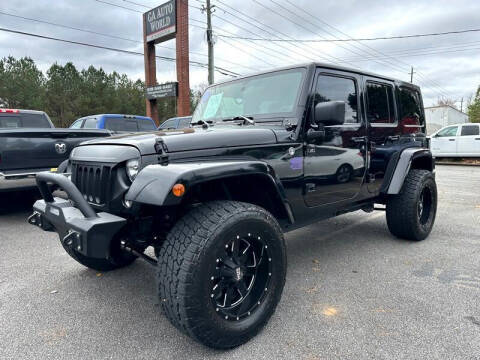 2014 Jeep Wrangler Unlimited for sale at CU Carfinders in Norcross GA