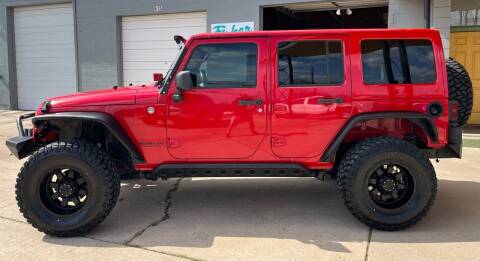 2014 Jeep Wrangler Unlimited for sale at Fisher Auto Sales in Longview TX