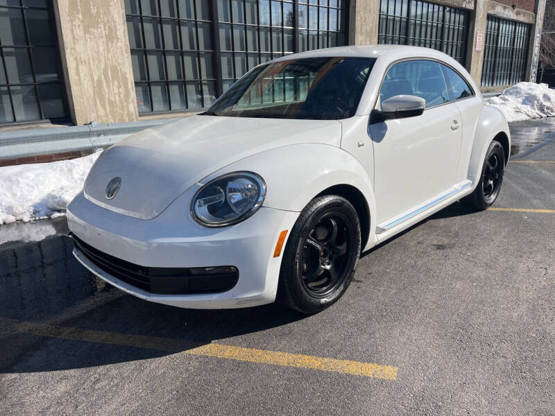 2012 Volkswagen Beetle for sale at Apple Auto Sales Inc in Camillus NY