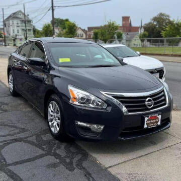 2015 Nissan Altima for sale at A & J AUTO GROUP in New Bedford MA