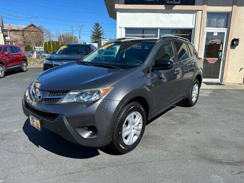 2013 Toyota RAV4 for sale at ADAM AUTO AGENCY in Rensselaer NY