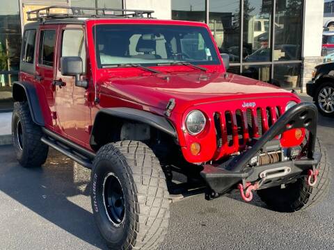 2011 Jeep Wrangler Unlimited for sale at First National Autos of Tacoma in Lakewood WA
