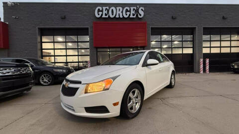 2012 Chevrolet Cruze for sale at George's Used Cars in Brownstown MI