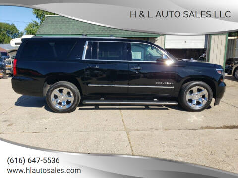 2015 Chevrolet Suburban for sale at H & L AUTO SALES LLC in Wyoming MI