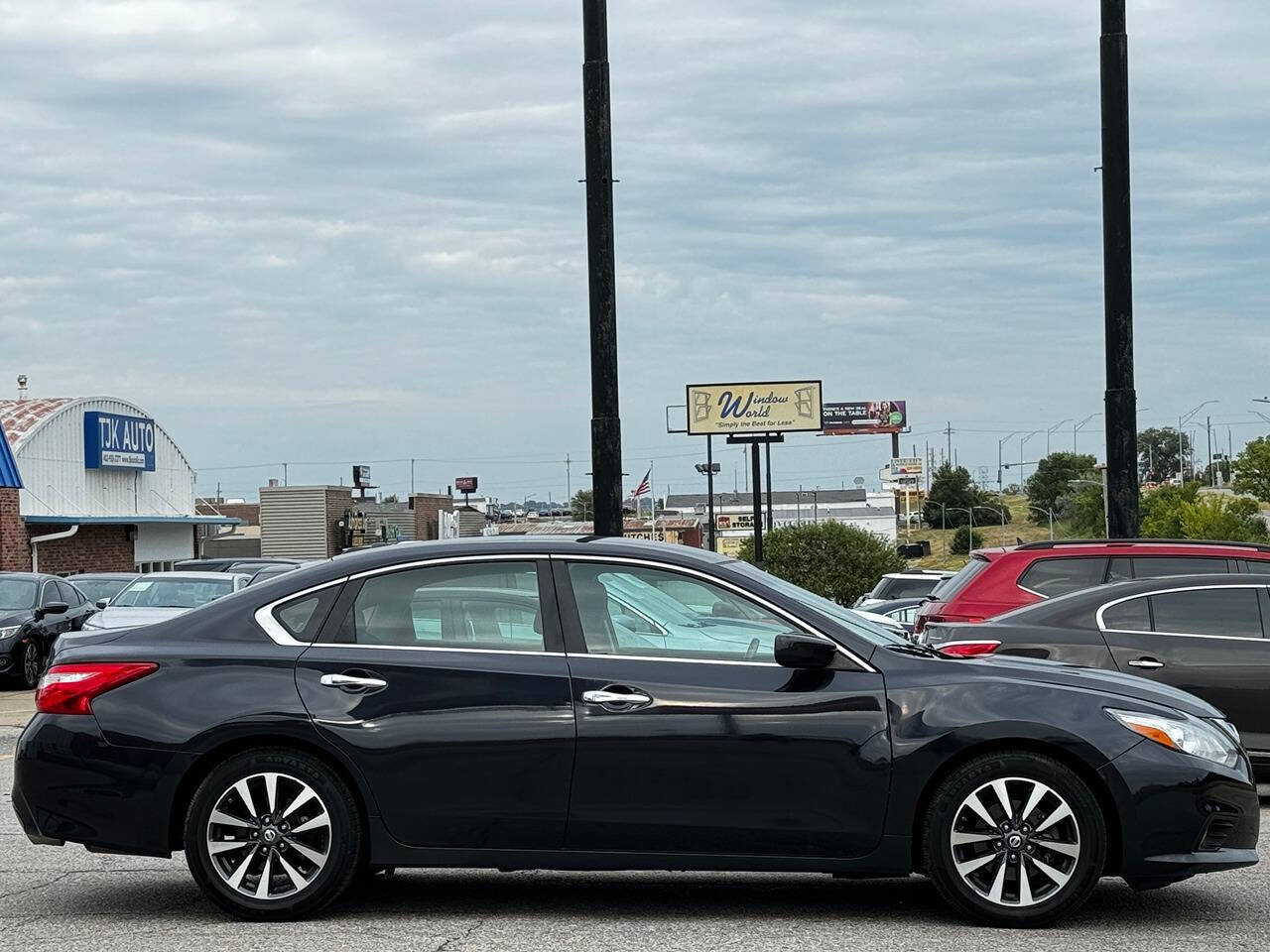 2017 Nissan Altima for sale at Optimus Auto in Omaha, NE