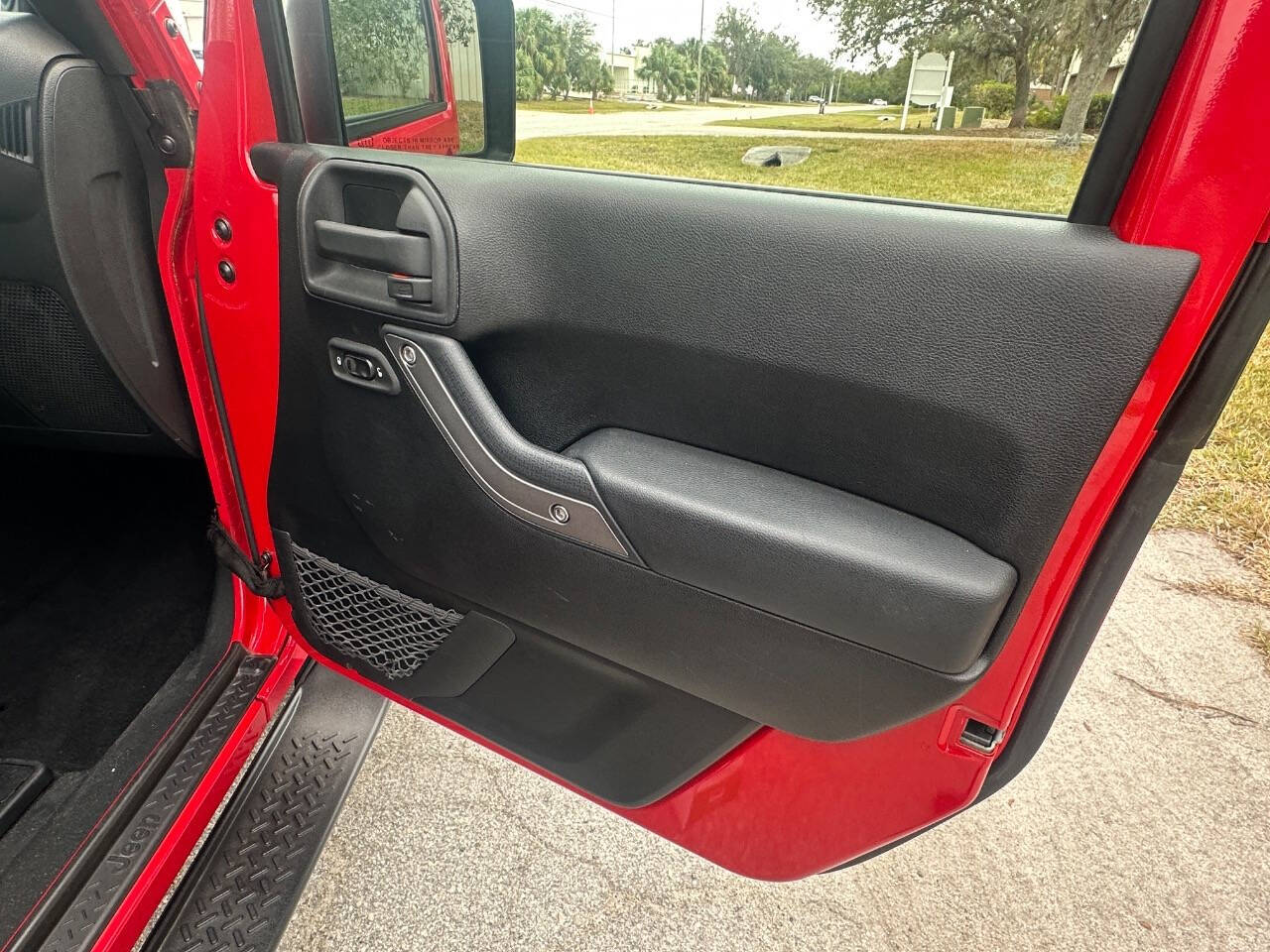 2011 Jeep Wrangler for sale at Rubi Motorsports in Sarasota, FL