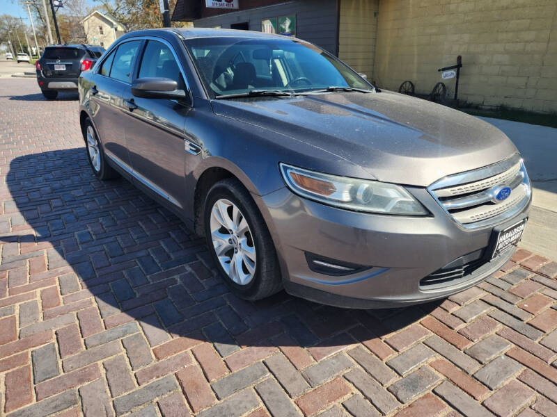 2012 Ford Taurus for sale at Haraldson Auto Mart in La Porte City IA