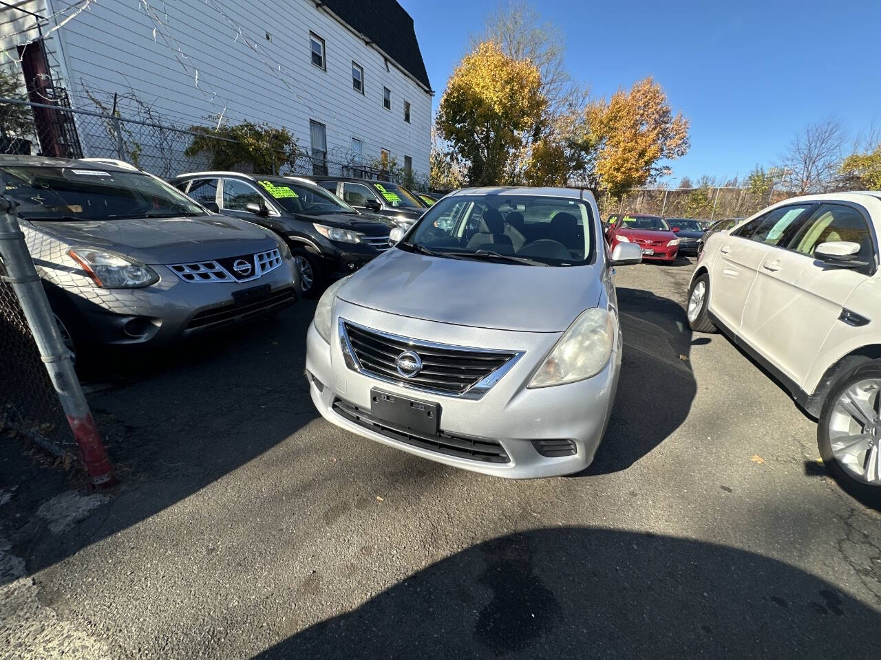 2013 Nissan Versa for sale at 77 Auto Mall in Newark, NJ