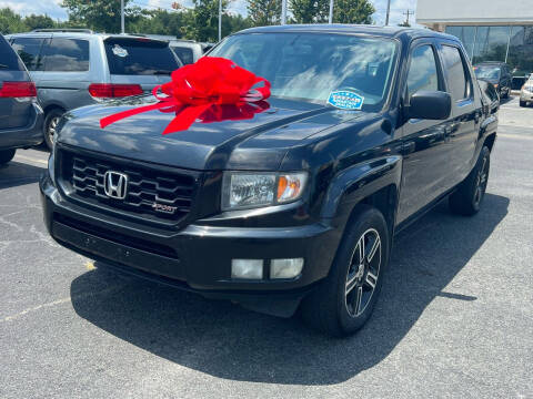2013 Honda Ridgeline for sale at Charlotte Auto Group, Inc in Monroe NC