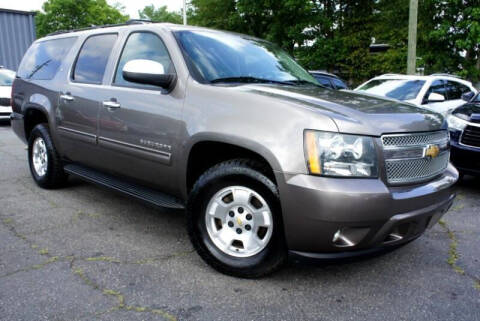 2013 Chevrolet Suburban for sale at CU Carfinders in Norcross GA