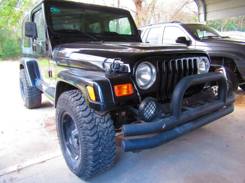 2000 Jeep Wrangler for sale at AUTO VALUE FINANCE INC in Houston TX