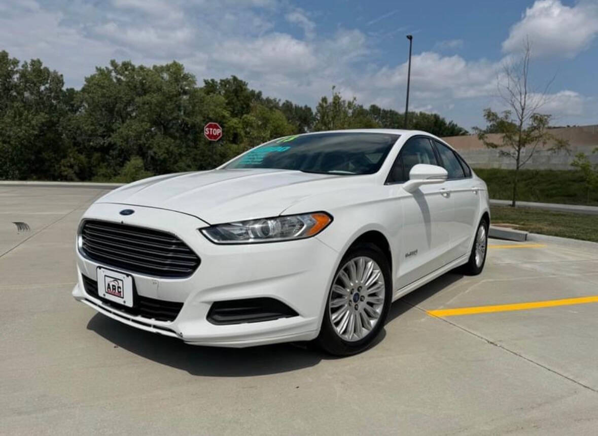 2013 Ford Fusion Hybrid for sale at Arc Auto Sales in Omaha, NE