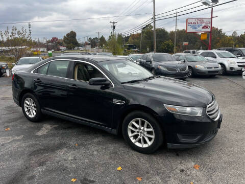 2014 Ford Taurus for sale at Links Sales & Service in Arnold MO