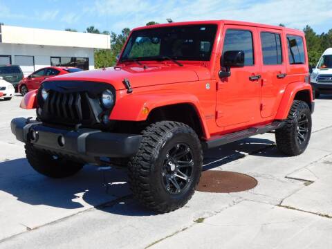 2014 Jeep Wrangler Unlimited for sale at Truck Town USA in Fort Pierce FL