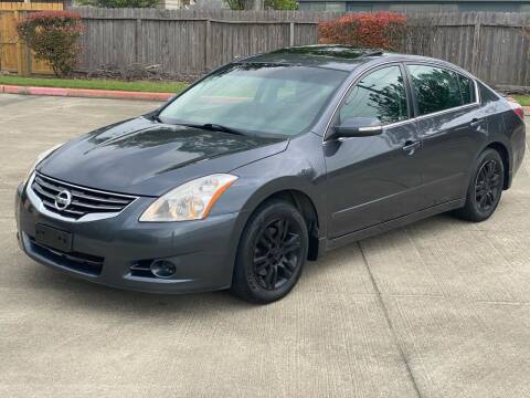 2012 Nissan Altima for sale at KM Motors LLC in Houston TX