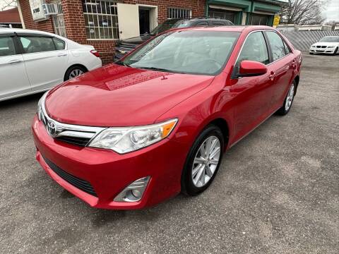 2014 Toyota Camry for sale at American Best Auto Sales in Uniondale NY