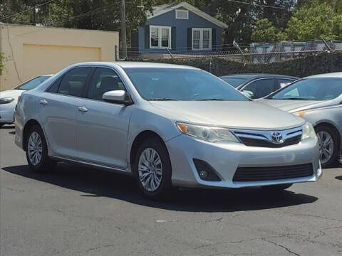 2012 Toyota Camry for sale at Sunny Florida Cars in Bradenton FL