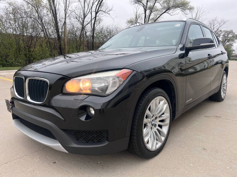 Used 2014 BMW X1 28i with VIN WBAVL1C55EVR93934 for sale in Elmhurst, IL