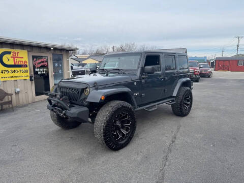 2016 Jeep Wrangler Unlimited for sale at CarTime in Rogers AR