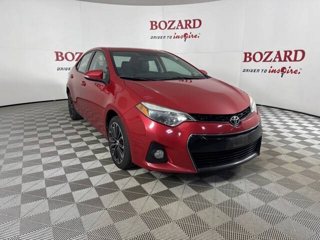 2015 Toyota Corolla for sale at BOZARD FORD in Saint Augustine FL