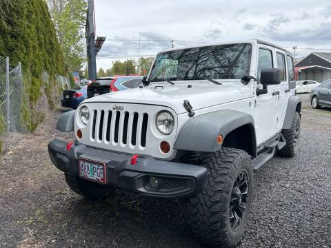 2011 Jeep Wrangler Unlimited for sale at Universal Auto Sales Inc in Salem OR