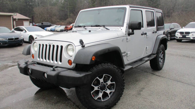 2011 Jeep Wrangler Unlimited for sale at Atlanta Luxury Motors Inc. in Buford GA