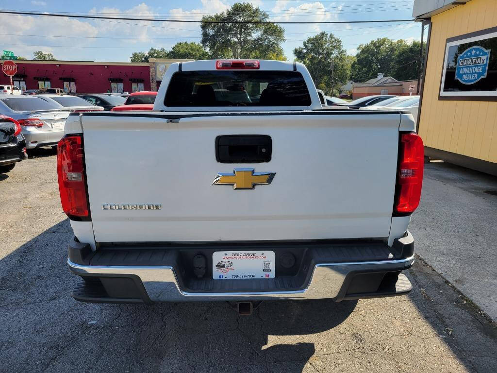 2015 Chevrolet Colorado for sale at DAGO'S AUTO SALES LLC in Dalton, GA