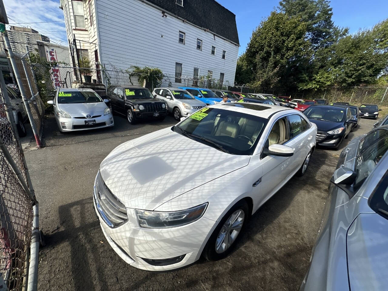 2014 Ford Taurus for sale at 77 Auto Mall in Newark, NJ