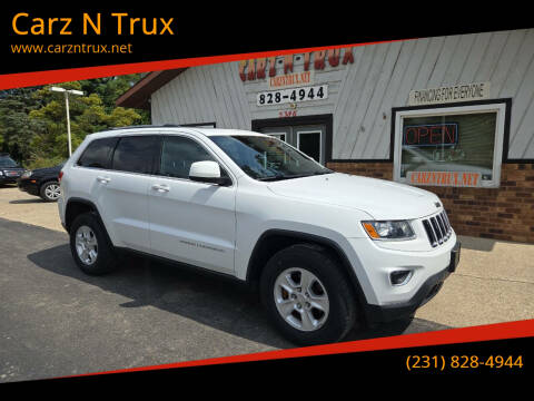 2014 Jeep Grand Cherokee for sale at Carz N Trux in Twin Lake MI