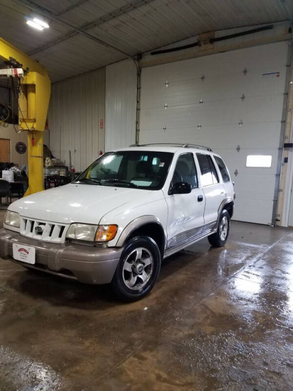 2002 Kia Sportage for sale at WESTSIDE GARAGE LLC in Keokuk IA