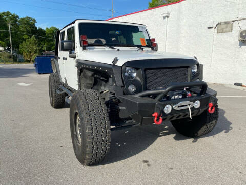 2015 Jeep Wrangler Unlimited for sale at Consumer Auto Credit in Tampa FL