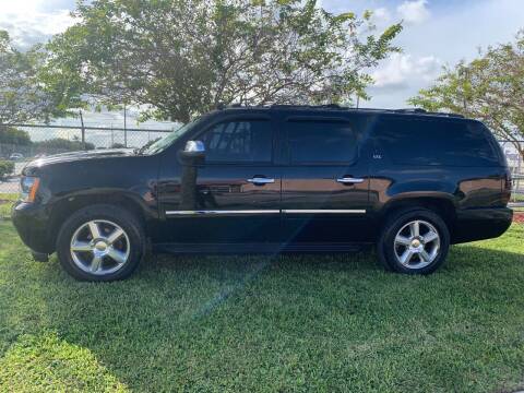 2013 Chevrolet Suburban for sale at DREAMS CARS & TRUCKS SPECIALTY CORP in Hollywood FL