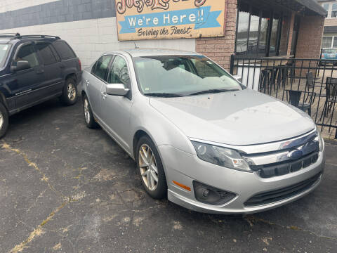 2010 Ford Fusion for sale at Holiday Auto Sales in Grand Rapids MI