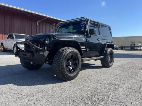 2014 Jeep Wrangler for sale at The Truck Barn in Ocala FL