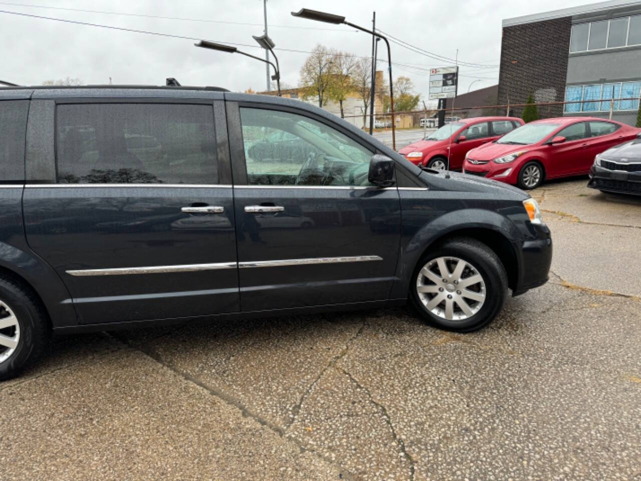 2014 Chrysler Town and Country for sale at First Class Auto Mall in Akron, OH