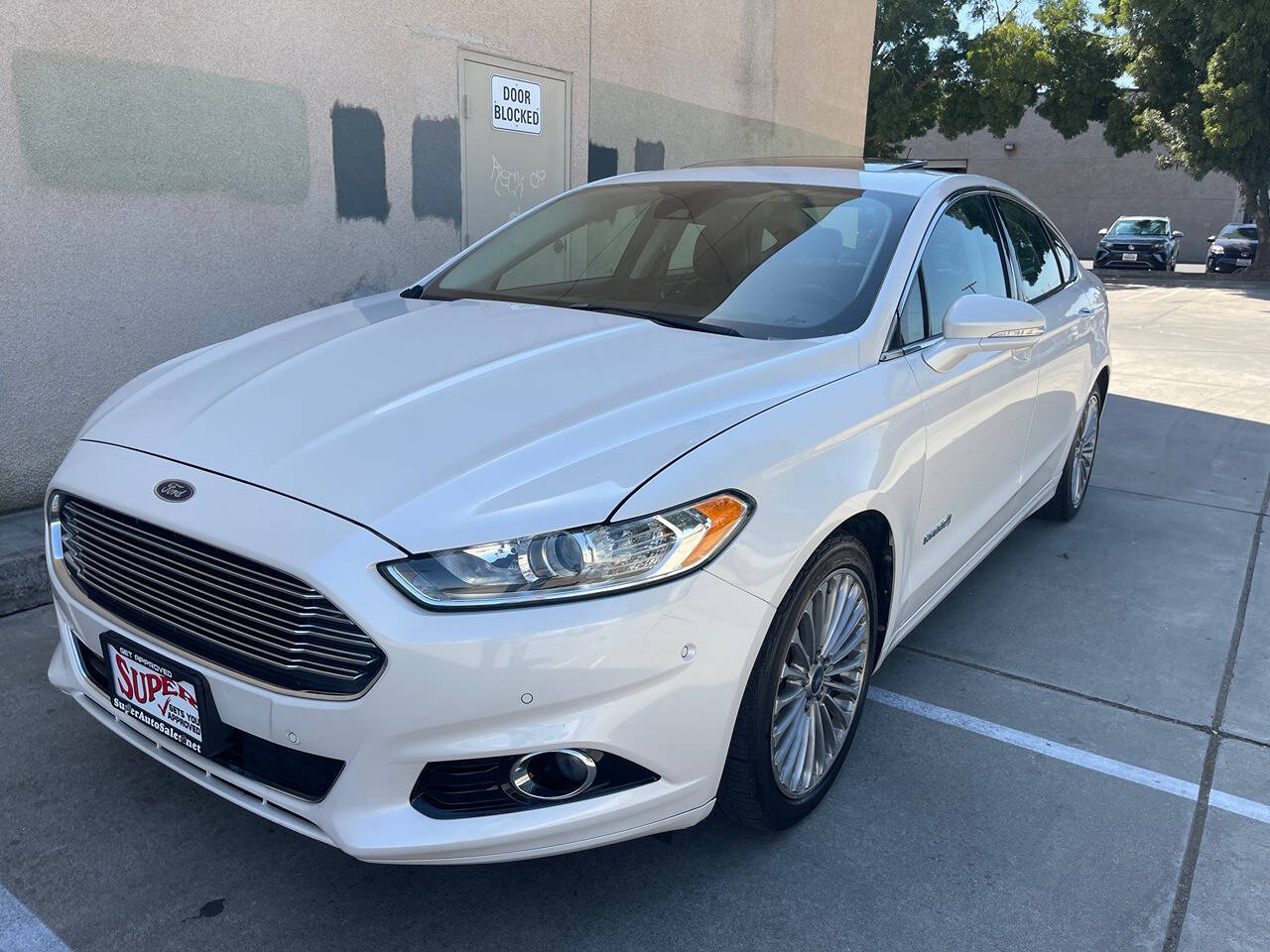 2014 Ford Fusion Hybrid for sale at Super Auto Sales Modesto in Modesto, CA