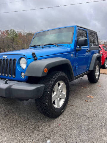 2015 Jeep Wrangler for sale at Boss Motor Co in Hohenwald TN