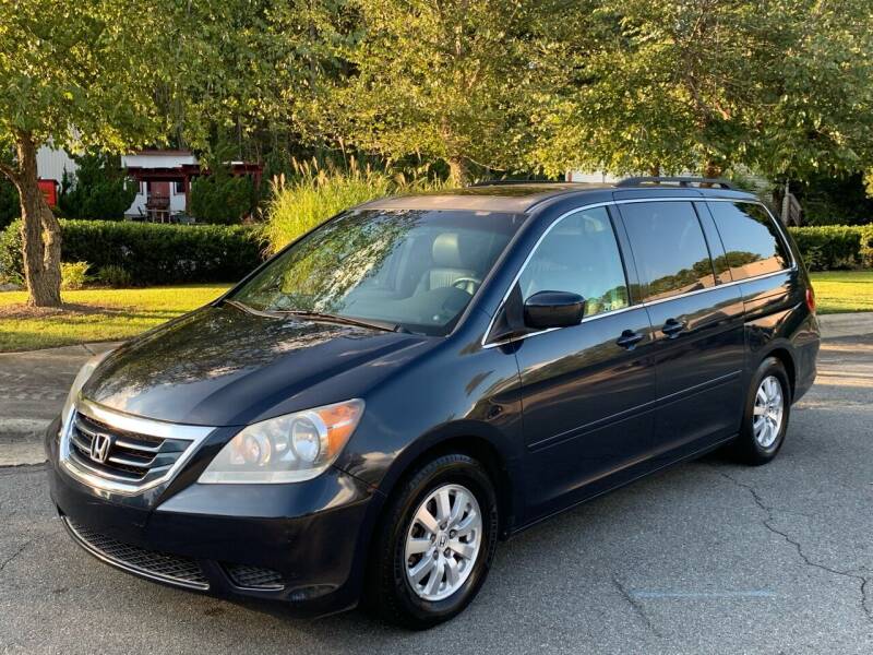 2009 Honda Odyssey for sale at Triangle Motors Inc in Raleigh NC