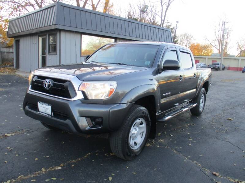 2013 Toyota Tacoma for sale at Triangle Auto Sales in Elgin IL