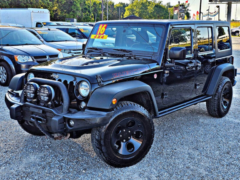 2016 Jeep Wrangler Unlimited for sale at CARMEAN AUTO GROUP LLC in Carroll OH