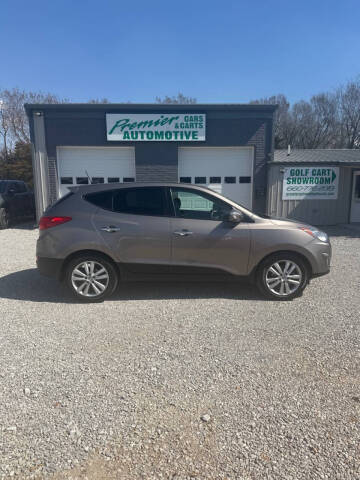 2012 Hyundai Tucson for sale at PREMIER AUTOMOTIVE in Lincoln MO