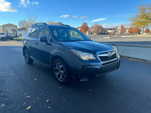 2015 Subaru Forester for sale at The Car-Mart in Bountiful UT