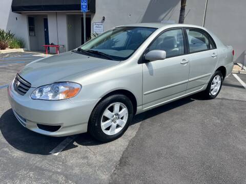 2003 Toyota Corolla for sale at MANGIONE MOTORS ORANGE COUNTY in Costa Mesa CA