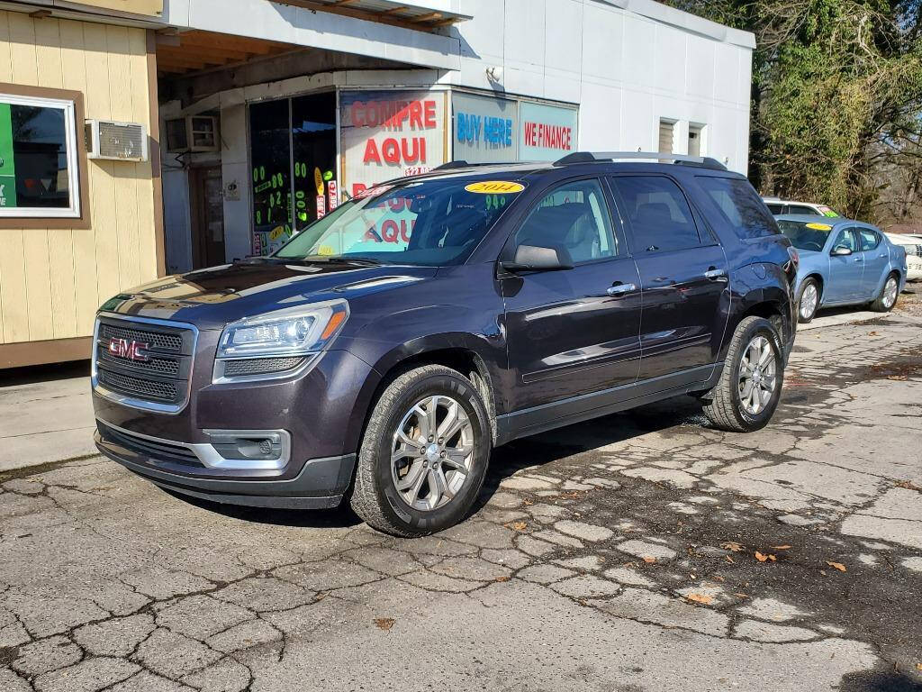 2014 GMC Acadia for sale at DAGO'S AUTO SALES LLC in Dalton, GA