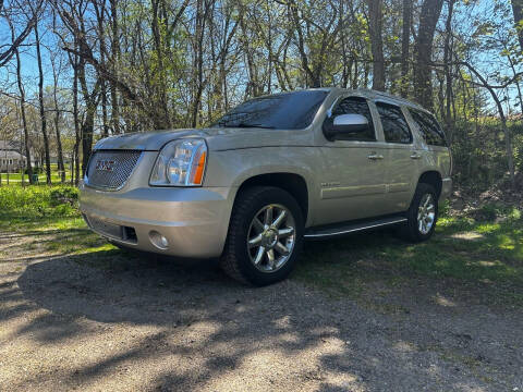 2013 GMC Yukon for sale at Rombaugh's Auto Sales in Battle Creek MI