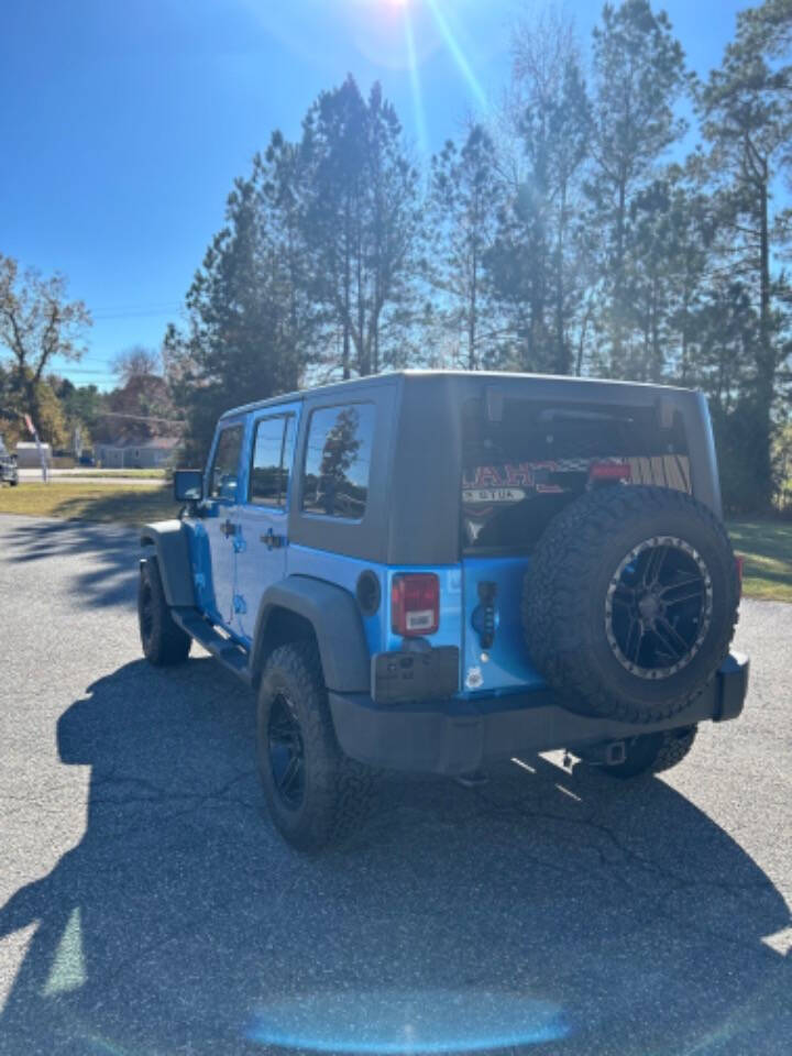 2010 Jeep Wrangler Unlimited for sale at Champs Auto Sales in Petersburg, VA