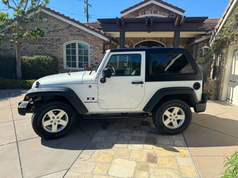 2009 Jeep Wrangler for sale at R P Auto Sales in Anaheim CA