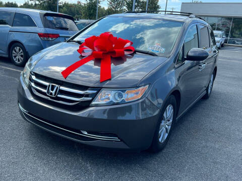 2014 Honda Odyssey for sale at Charlotte Auto Group, Inc in Monroe NC