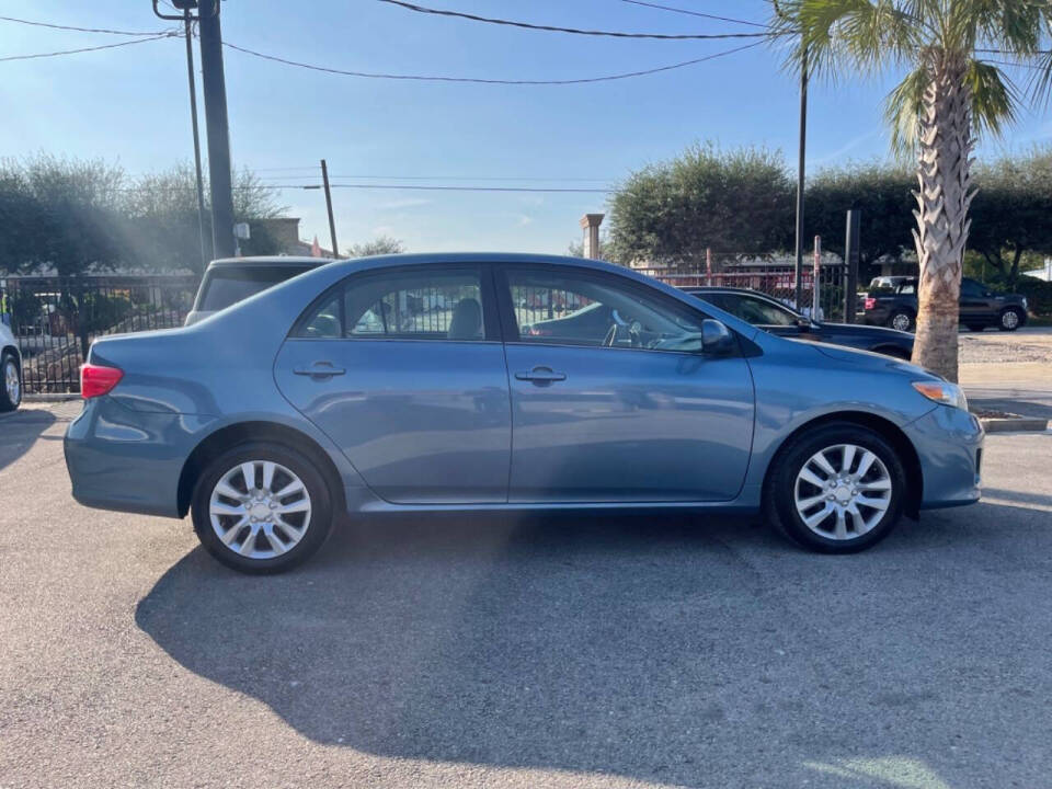 2013 Toyota Corolla for sale at SMART CHOICE AUTO in Pasadena, TX