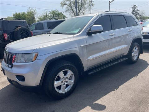 2013 Jeep Grand Cherokee for sale at HUFF AUTO GROUP in Jackson MI